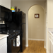 Model kitchen with black appliances